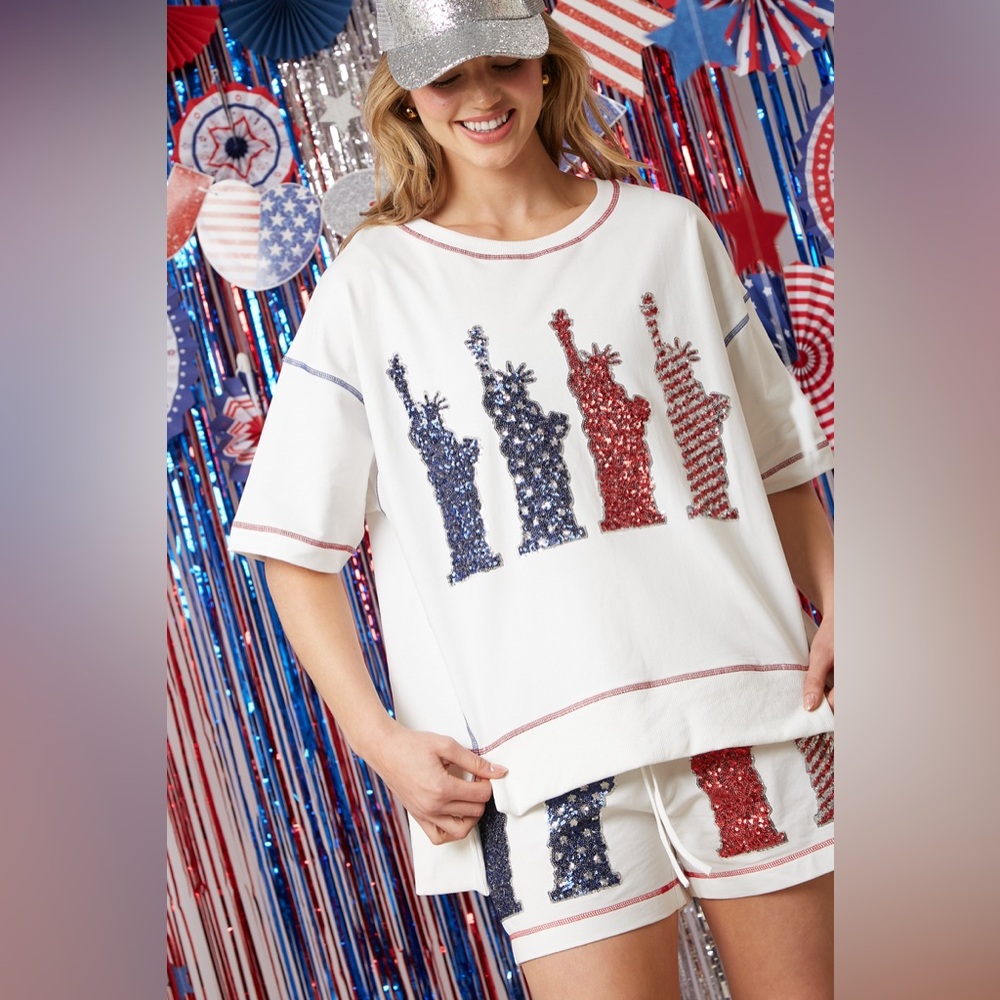 Fantastic Fawn White Top with Red and Blue Statue Design